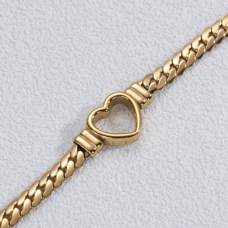 Hjärthålmönstrat Titan Armband