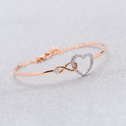 Roséguld Infinity Armband en touch av glamour